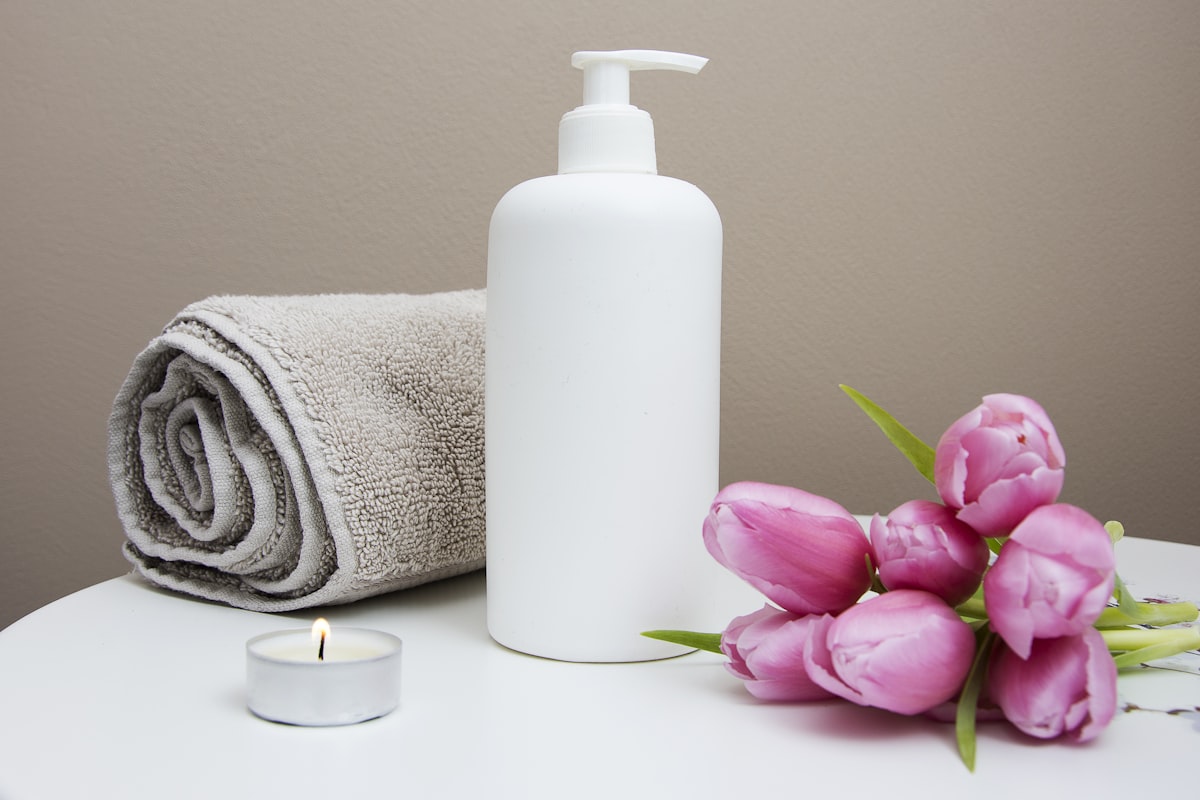 Calm spa setting with towel and candle